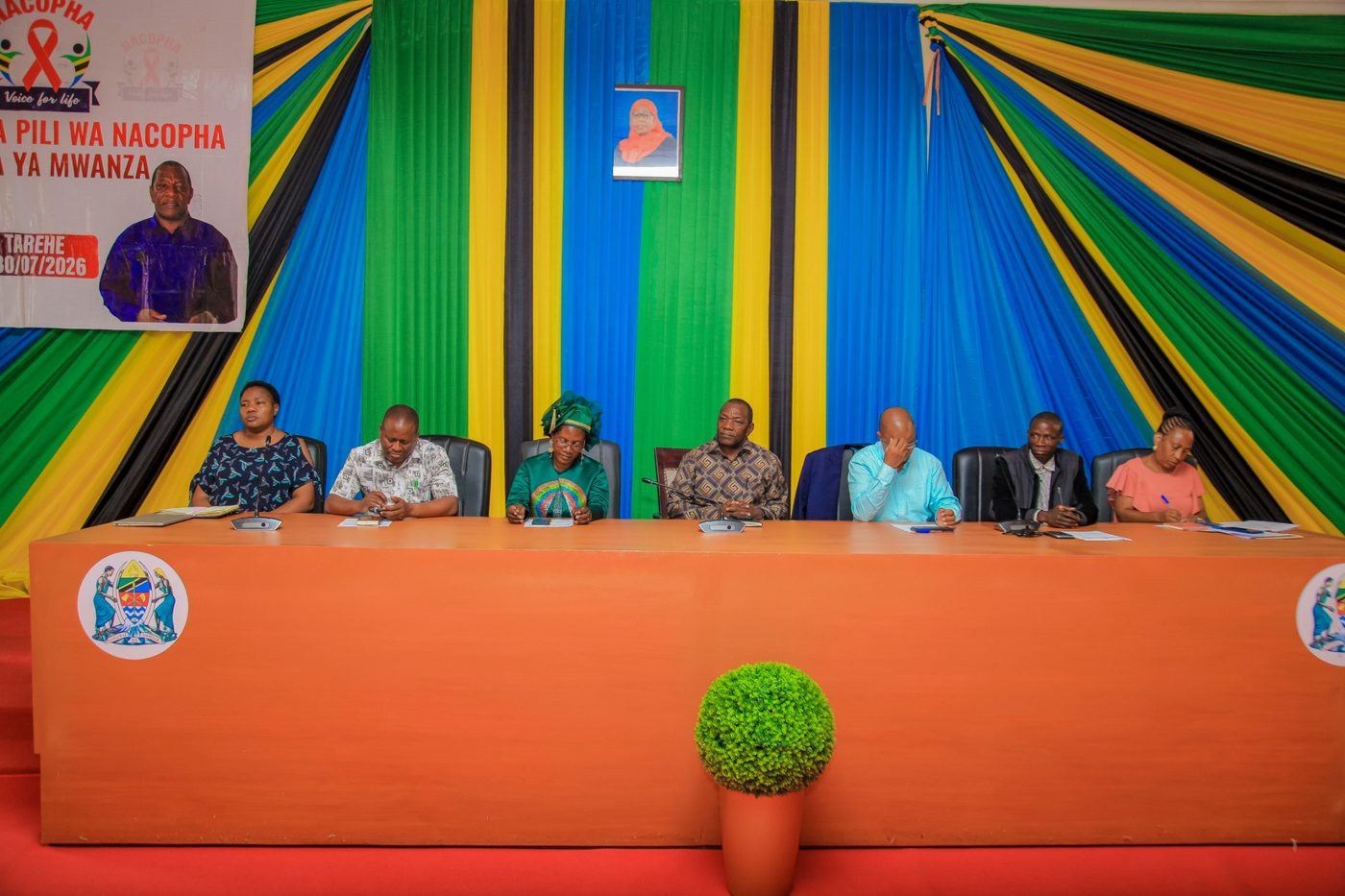 Members and leaders at the head table of a NACOPHA zonal meeting